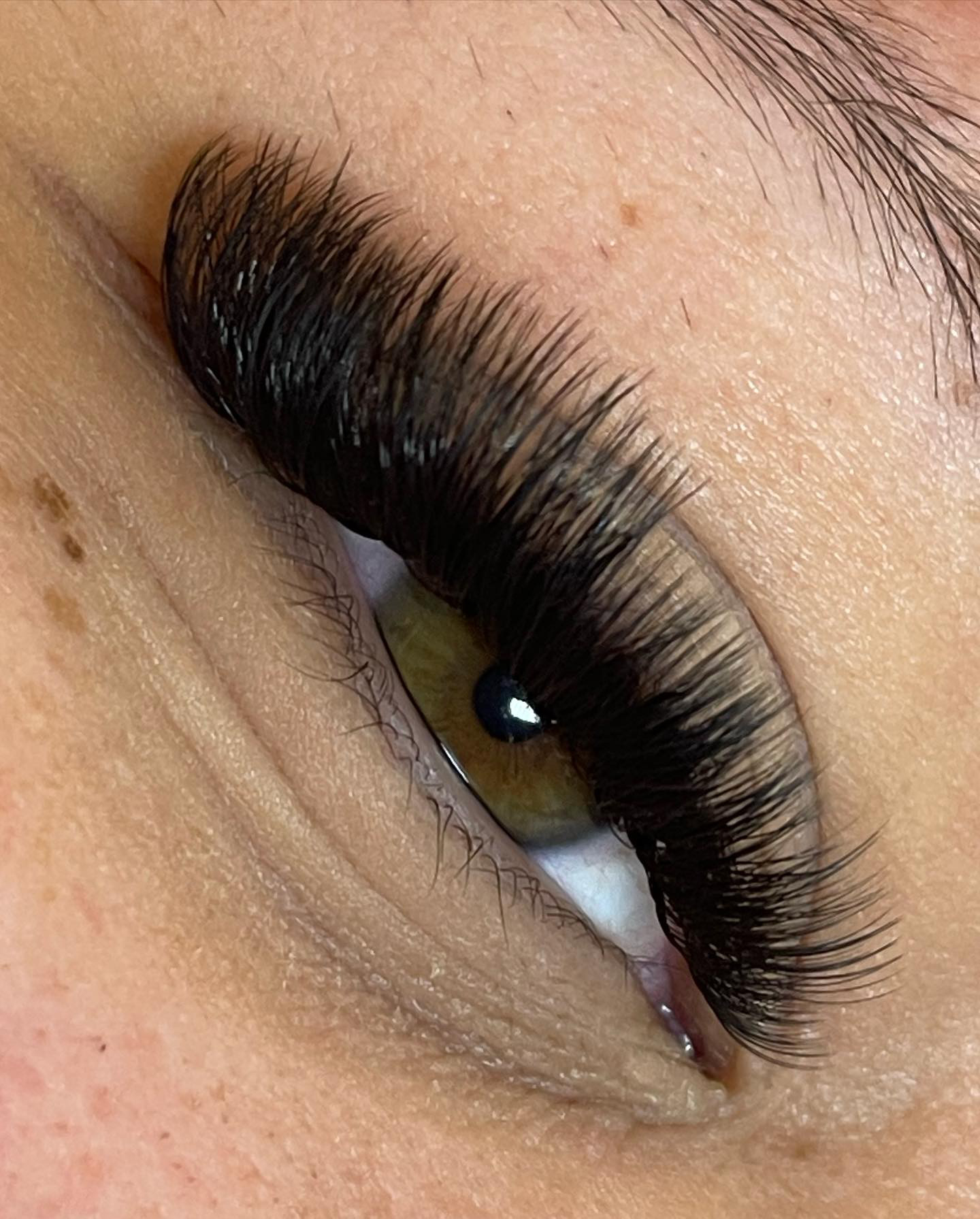 Mega volume lash extension close-up with dramatic density